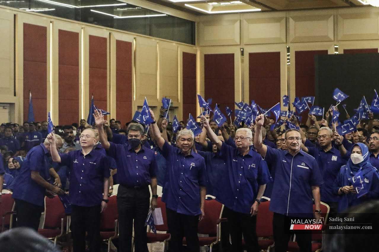 Barisan Nasional chairman Ahmad Zahid Hamidi with other coalition leaders at the announcement of BN's candidates for the 15th general election. 
