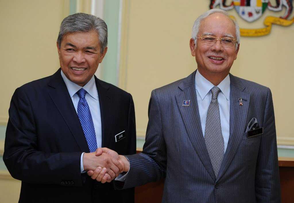 Deputy Prime Minister Ahmad Zahid Hamidi and former prime minister Najib Razak. Photo: AFP
