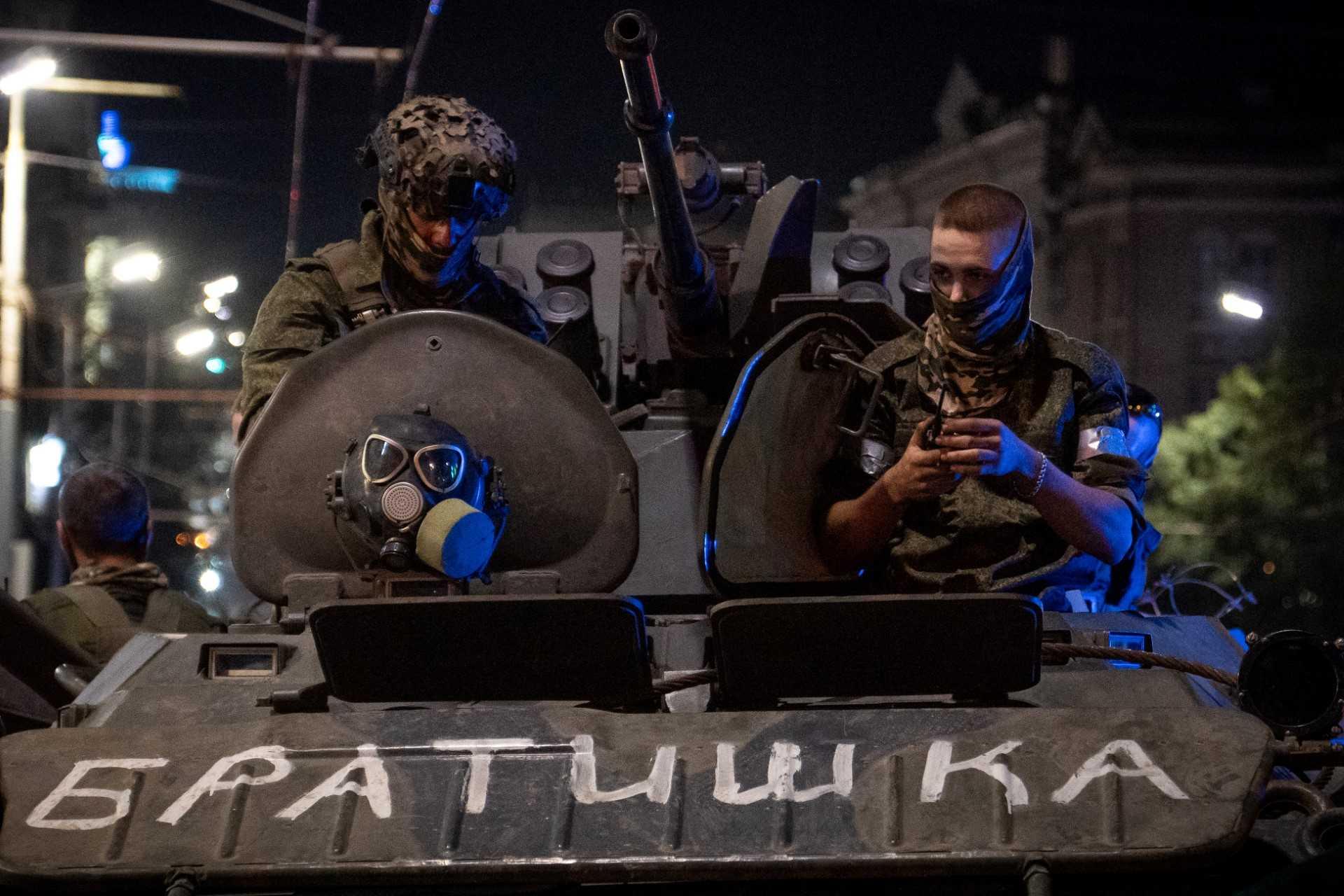 Members of Wagner group looks from a military vehicle with the sign read as 'Brother' in Rostov-on-Don late on June 24. Photo: AFP 