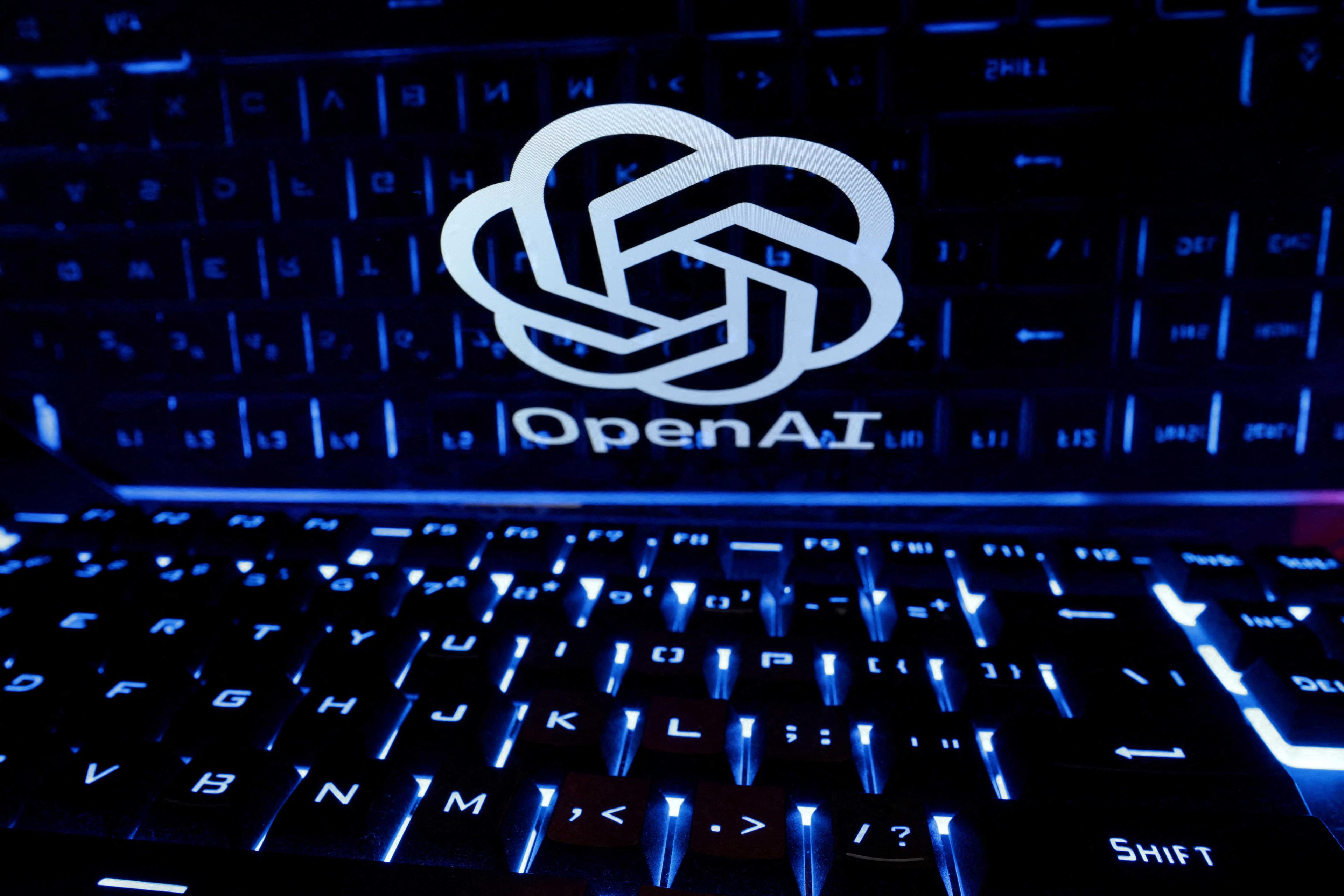A keyboard is placed in front of a displayed OpenAI logo in this illustration taken Feb 21. Photo: Reuters