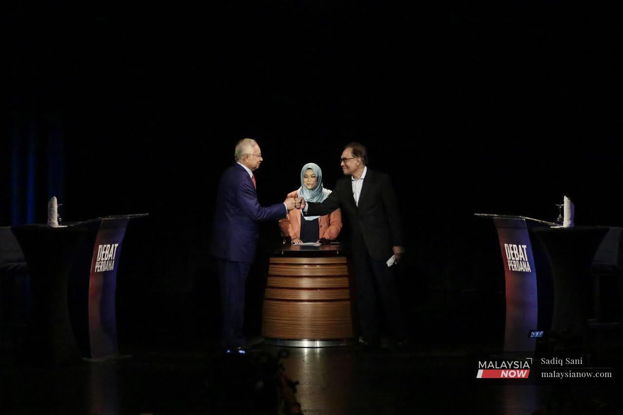 DebatPerdana_MNow_120522-1