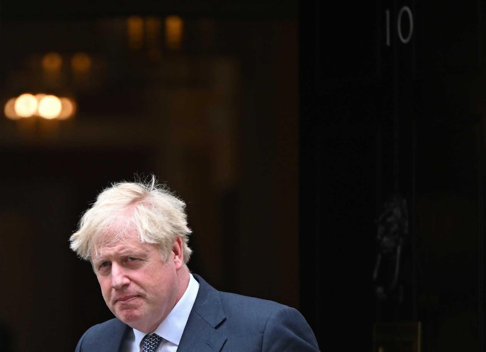 Britain's Prime Minister Boris Johnson leaves from 10 Downing Street in central London on July 5. Photo: AFP