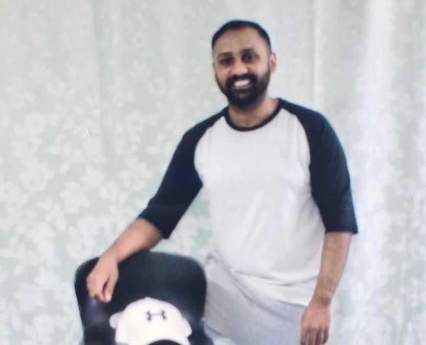 Kalwant Singh smiles for the camera in a photo session at Changi prison in Singapore just before his execution at dawn today. 
