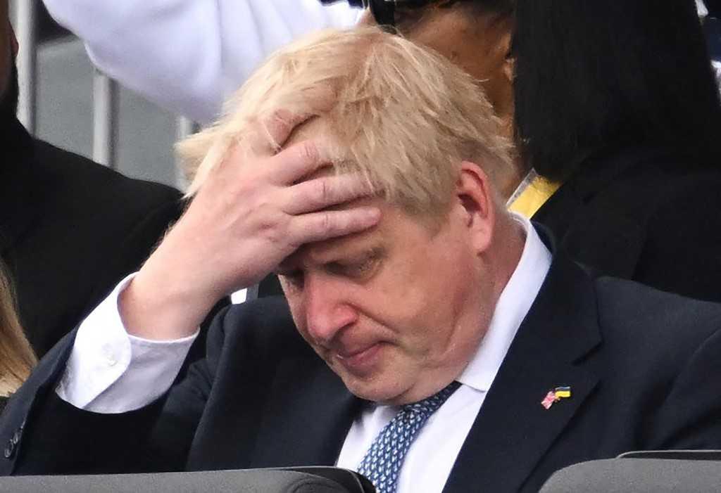 Britain's Prime Minister Boris Johnson reacts during the Platinum Pageant in London on June 5, as part of Queen Elizabeth II's platinum jubilee celebrations. Photo: AFP