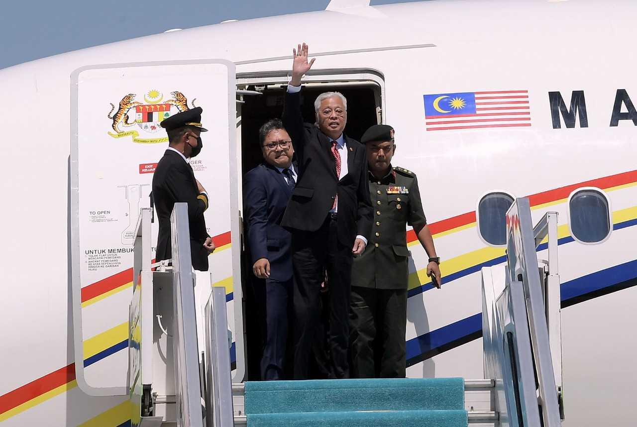 Prime Minister Ismail Sabri Yaakob waves upon his arrival at the Esenboğa International Airport in Ankara yesterday. Photo: Bernama