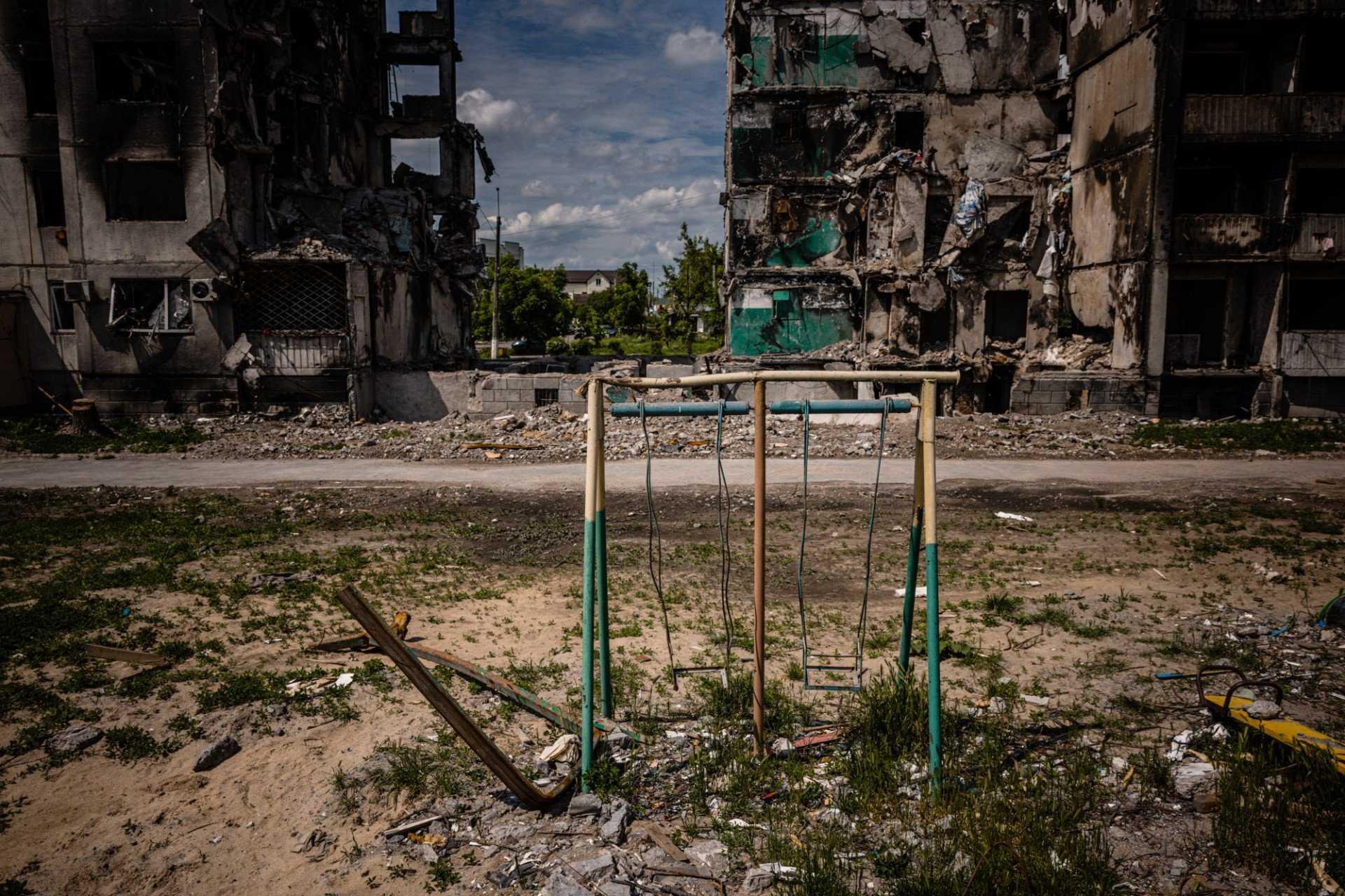 This photograph shows a playground and a destroyed apartment building in the town of Borodyanka on June 1, amid the Russian invasion of Ukraine. Photo: AFP