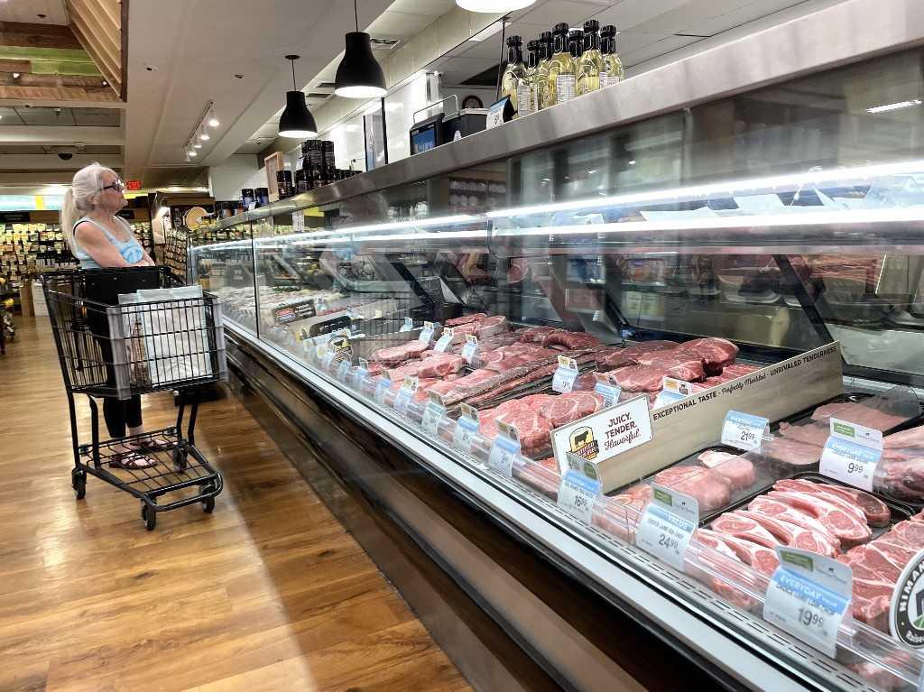 A customer shops for meat at an Andronico's supermarket on June 8, in San Anselmo, California. Photo: AFP