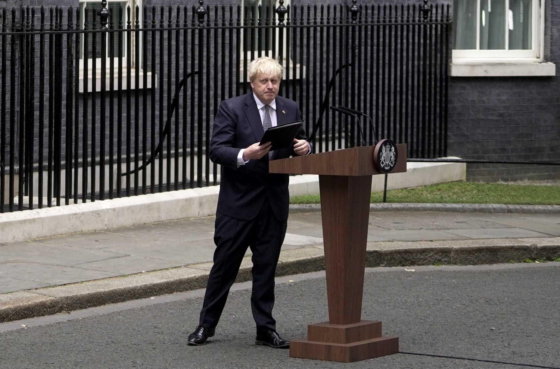 Britain's Prime Minister Boris Johnson makes a statement in front of 10 Downing Street in central London on July 7. Photo: AFP 