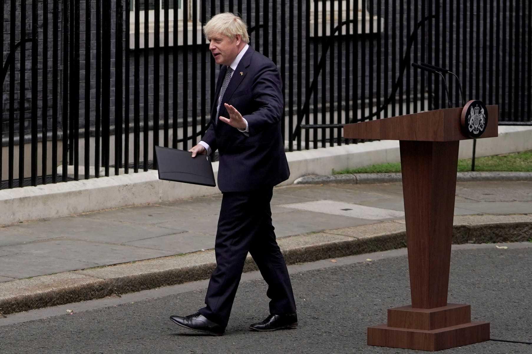 Britain's Prime Minister Boris Johnson leaves after making a statement in front of 10 Downing Street in central London on July 7. Photo: AFP