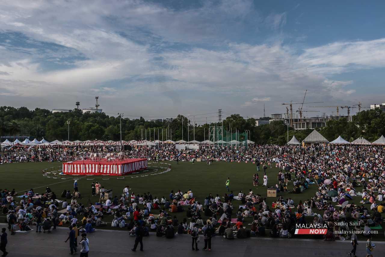 Participants gather at the Panasonic National Sport Complex in Shah Alam for the first Bon Odori festival in two years, on July 16, 2022. 