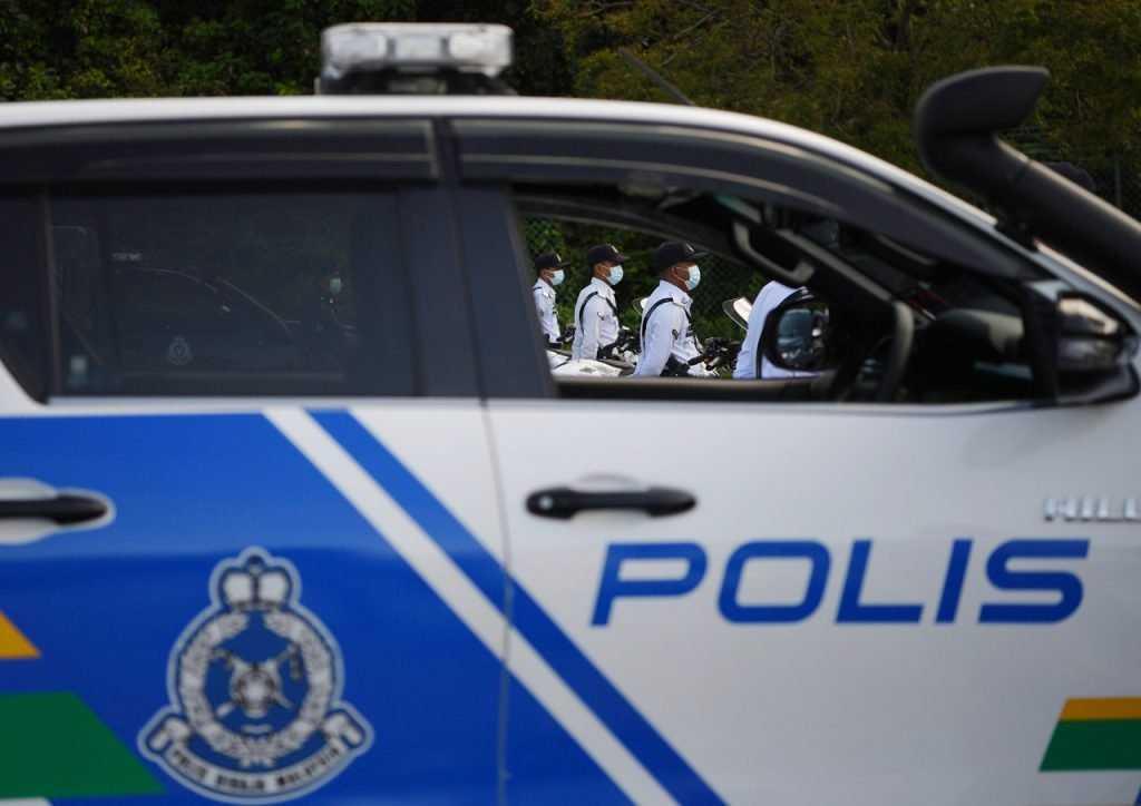 Police say that detainees at lock-ups are only allowed visits by family members and lawyers. Photo: Bernama