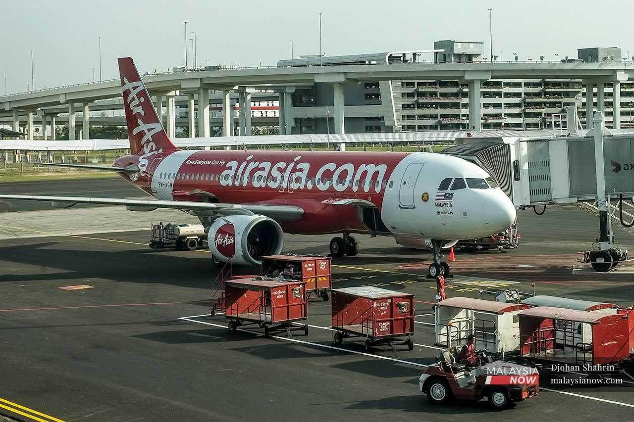 An AirAsia plane waits on the tarmac at KLIA in Sepang in this file picture.