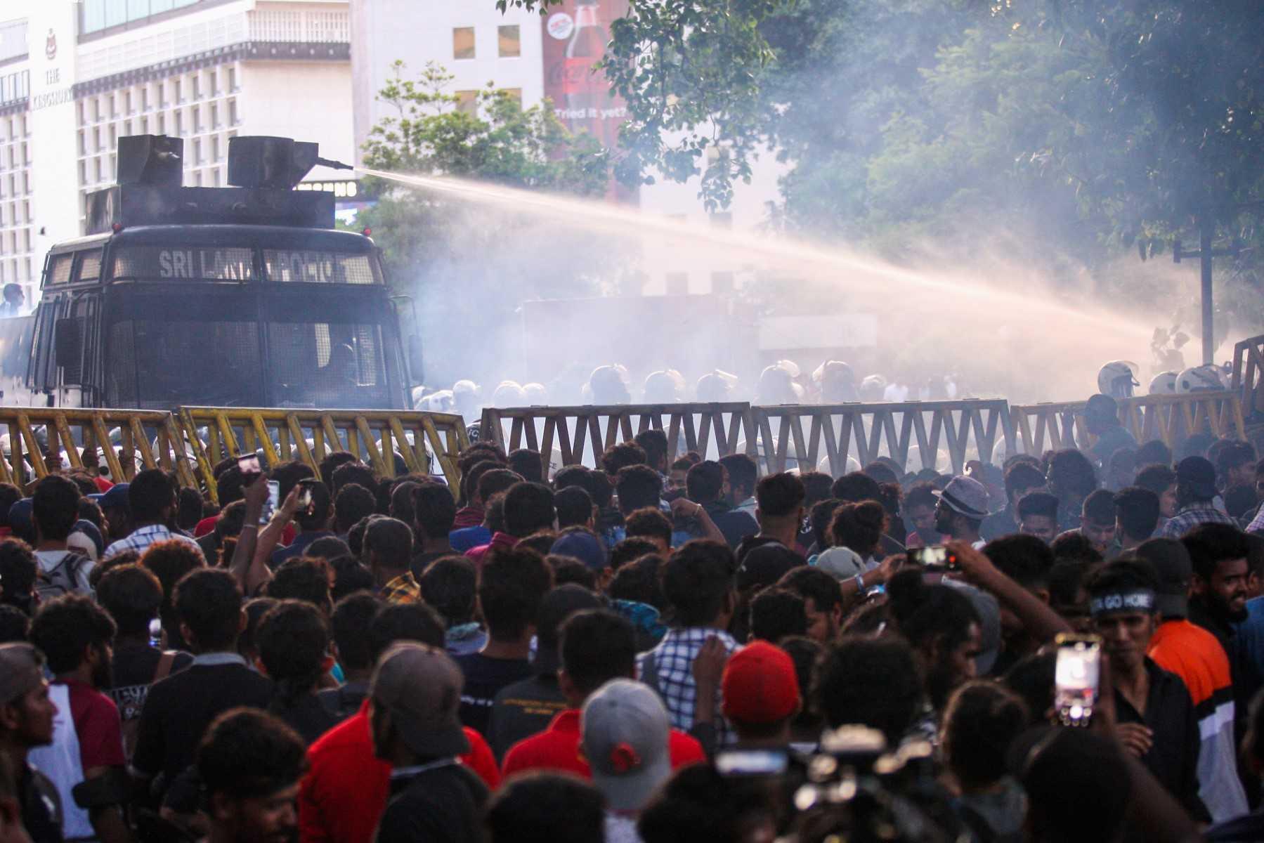Police use a water canon to disperse demonstrators taking part in an anti-government protest demanding the resignation of Sri Lanka's President Gotabaya Rajapaksa over the country's crippling economic crisis, in Colombo on July 8. Photo: AFP