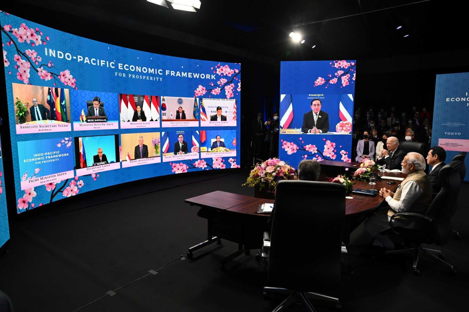 US President Joe Biden, Japan's Prime Minister Fumio Kishida, and India's Prime Minister Narendra Modi attend the Indo-Pacific Economic Framework for Prosperity with other regional leaders via video link at the Izumi Garden Gallery in Tokyo on May 23. Photo: AFP