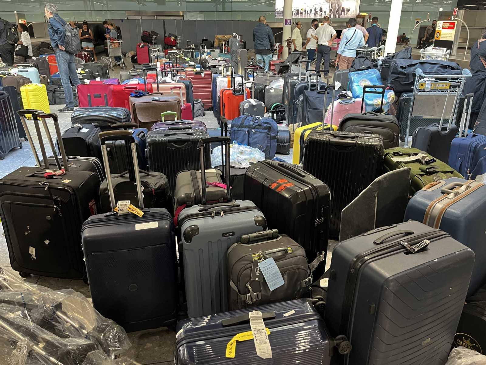 Suitcases are seen uncollected at Heathrow's Terminal Three baggage reclaim, west of London on July 8. Photo: AFP