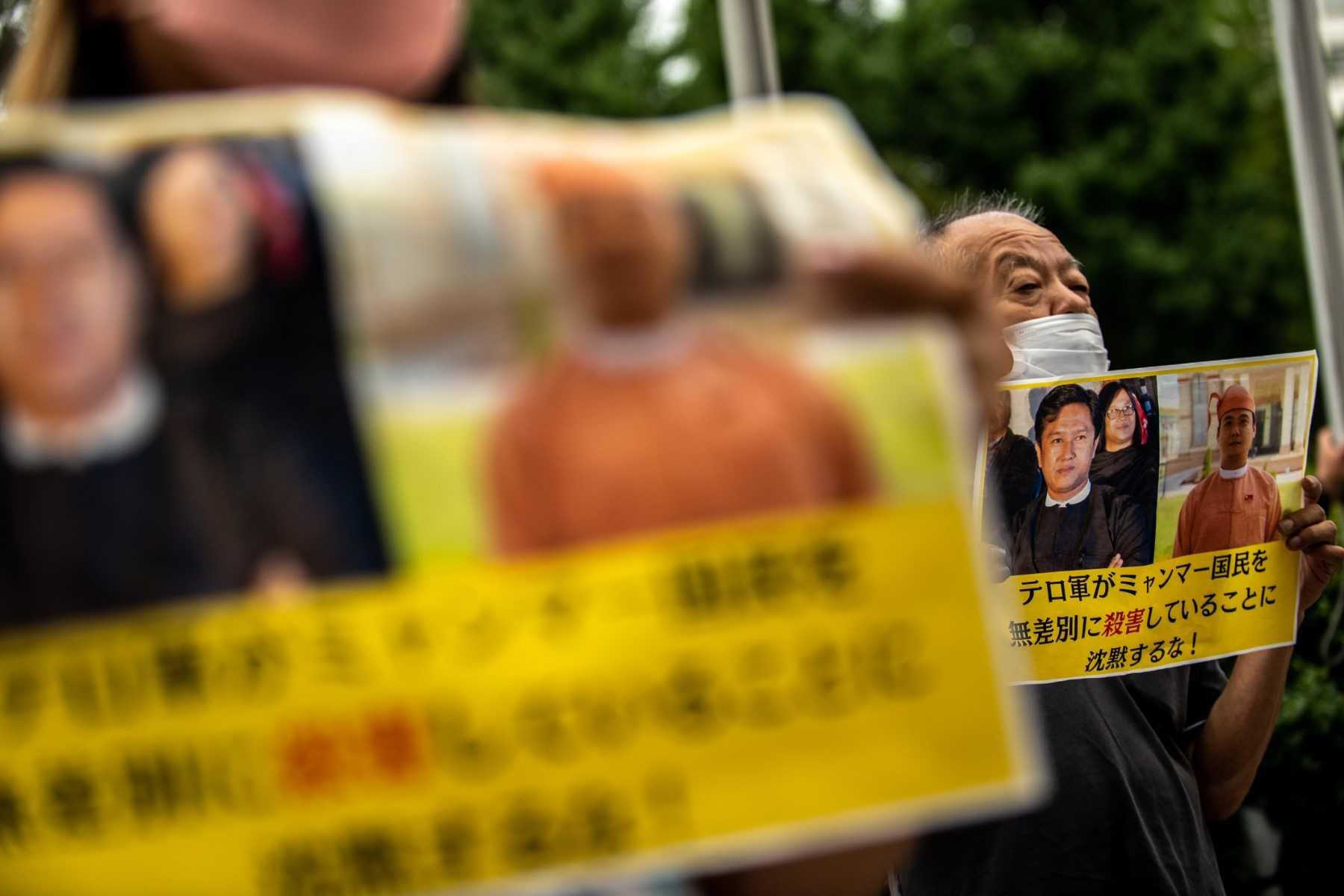 Activists including Myanmar nationals take part in a rally to protest Myanmar's junta execution of four prisoners, outside the United Nations University in Tokyo on July 26. Photo: AFP