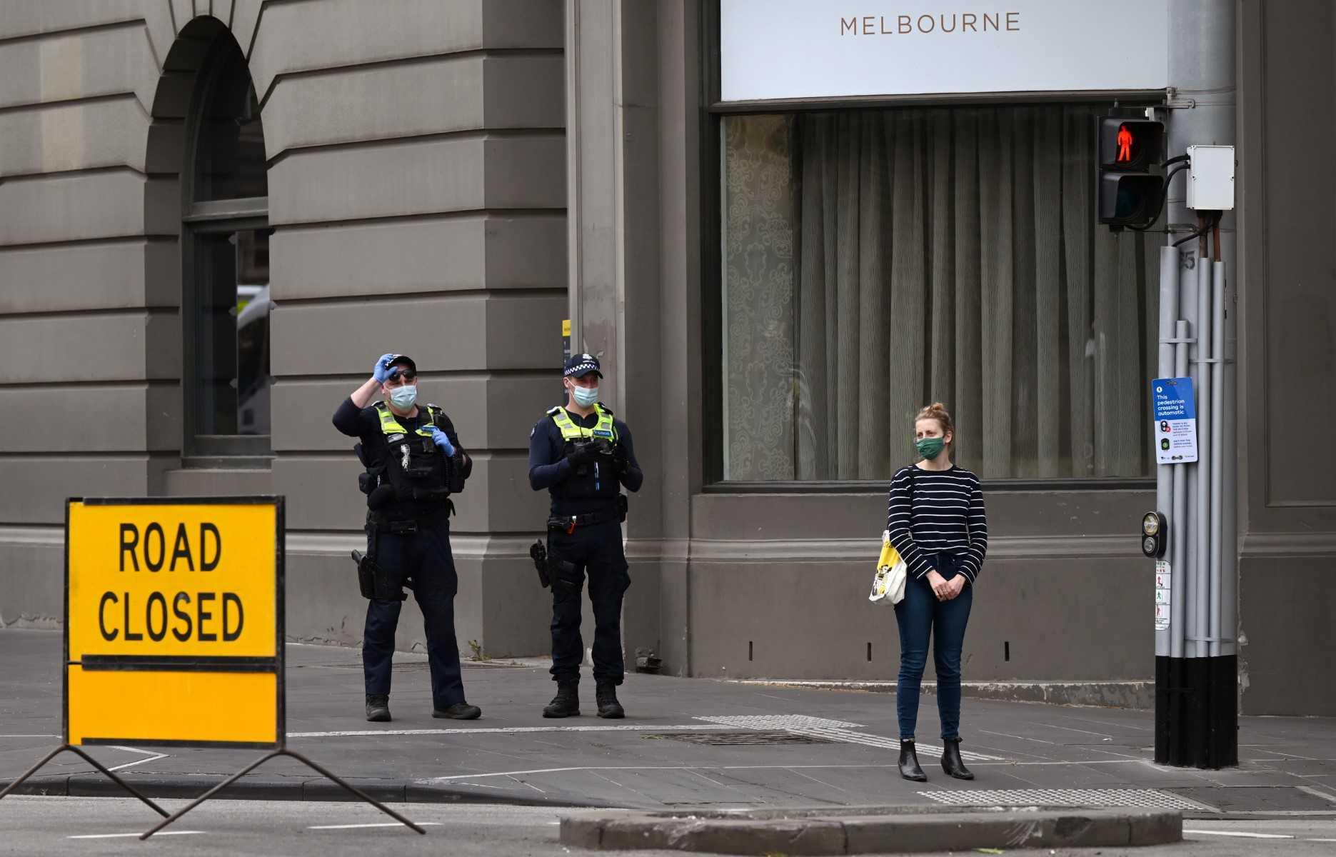 Police patrol the streets in Melbourne on Sept 30, 2021 as the city grapples with a surge in Covid-19 infections. Photo: AFP 