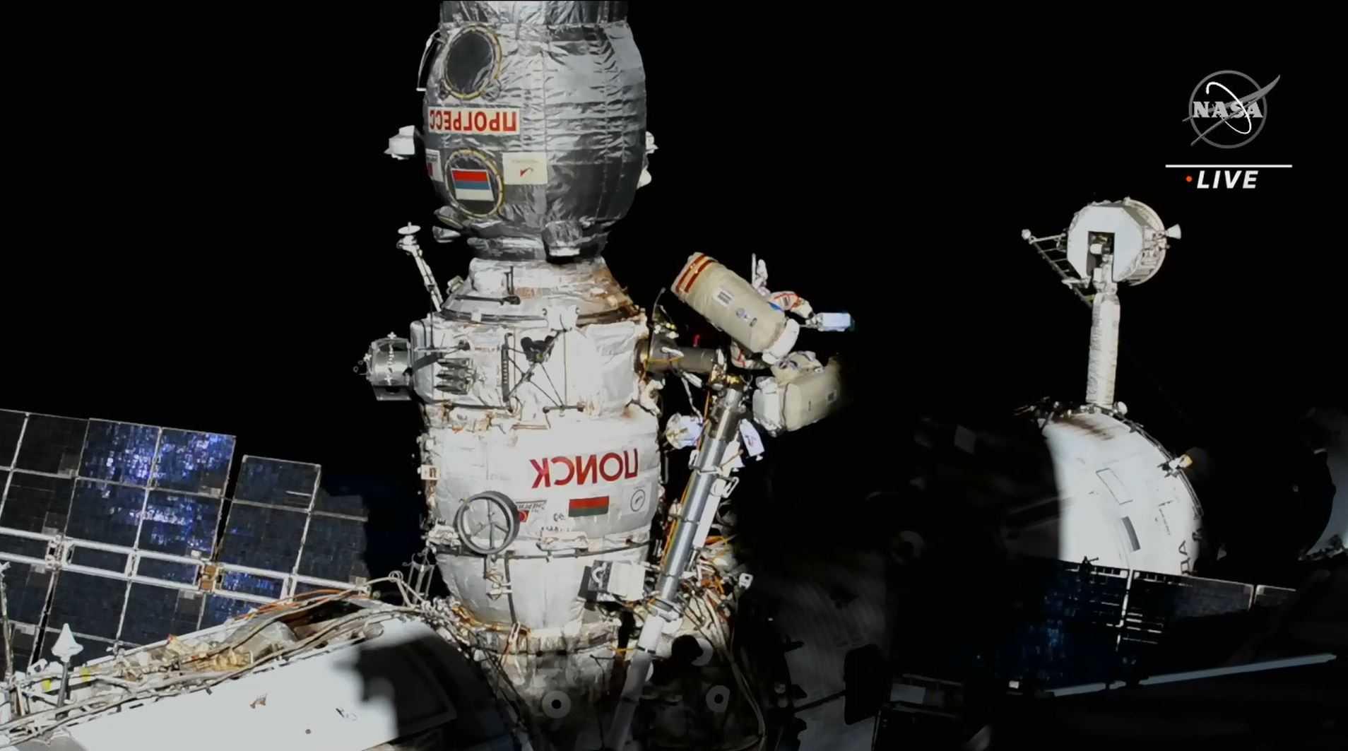 In this still image taken from a Nasa TV broadcast, two astronauts work outside the International Space Station on July 21, to continue outfitting the European robotic arm on the International Space Station’s Nauka laboratory. Photo: AFP 