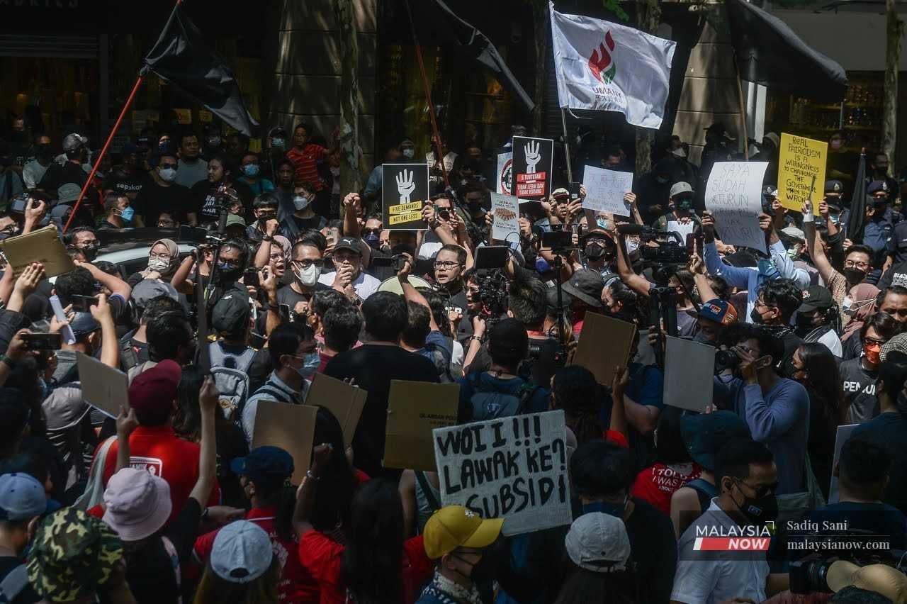 Protesters gather at Jalan Tunku Abdul Rahman in Kuala Lumpur during the 'Turun' rally on July 23. 
