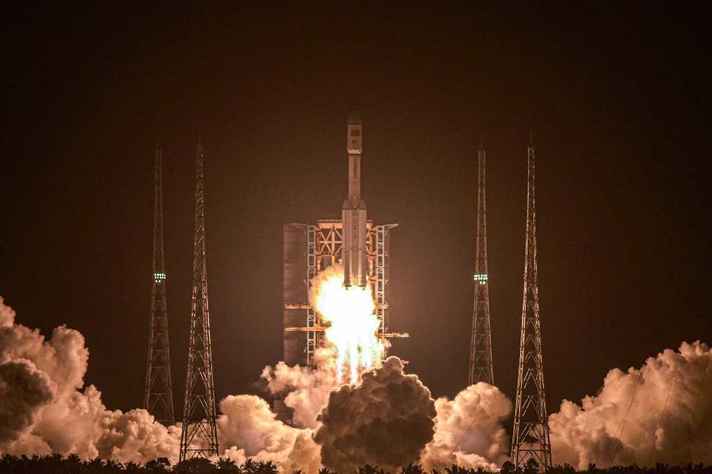 A Long March 7 rocket, carrying China's Tianzhou-2 cargo craft, lifts off from the Wenchang Space Launch Center in southern China's Hainan province on May 29 last year. Photo: AFP
