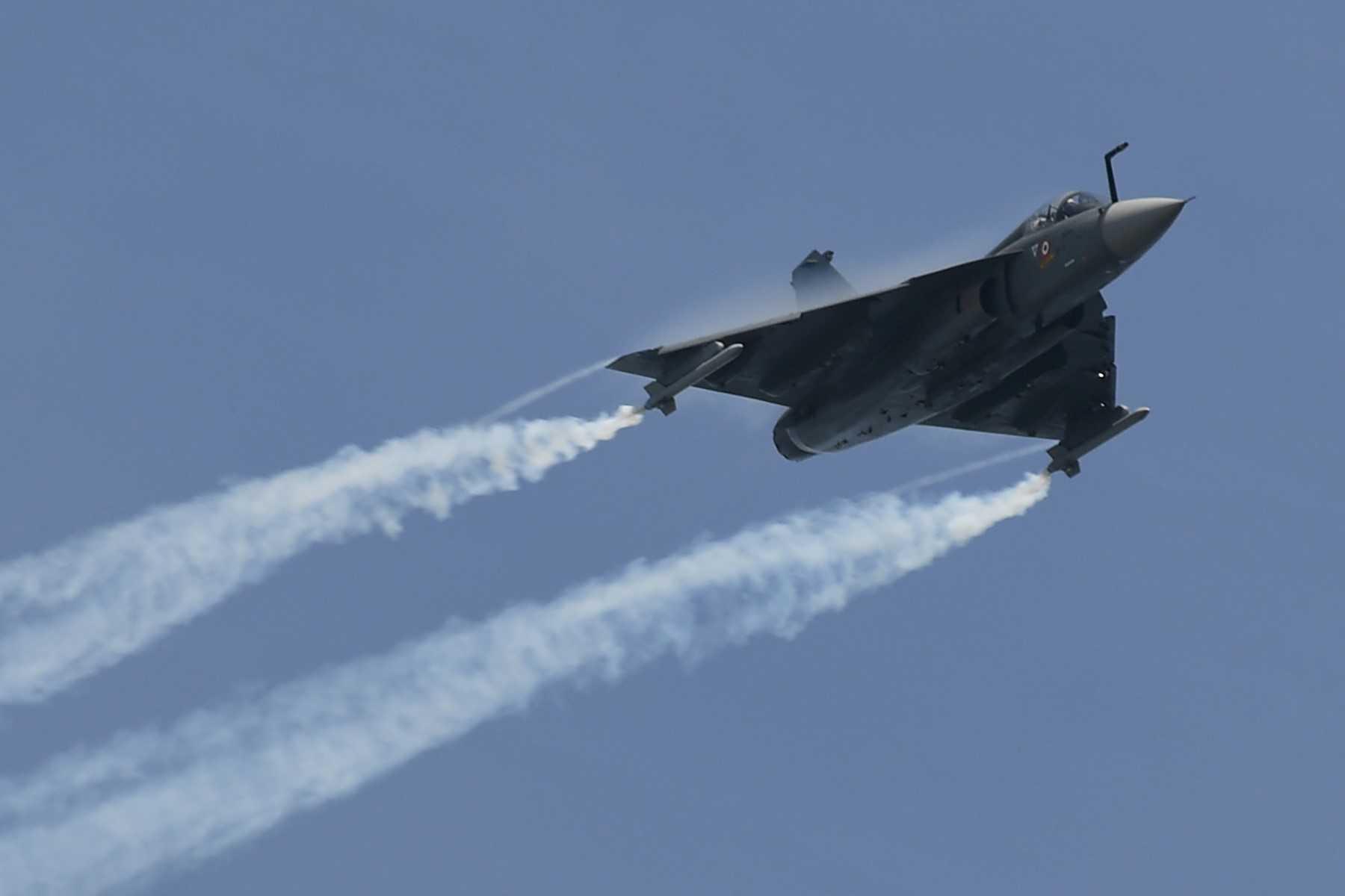 An Indian Air Force Tejas light combat aircraft flies past during a preview of the Singapore Airshow in Singapore on Feb 13. Photo: AFP