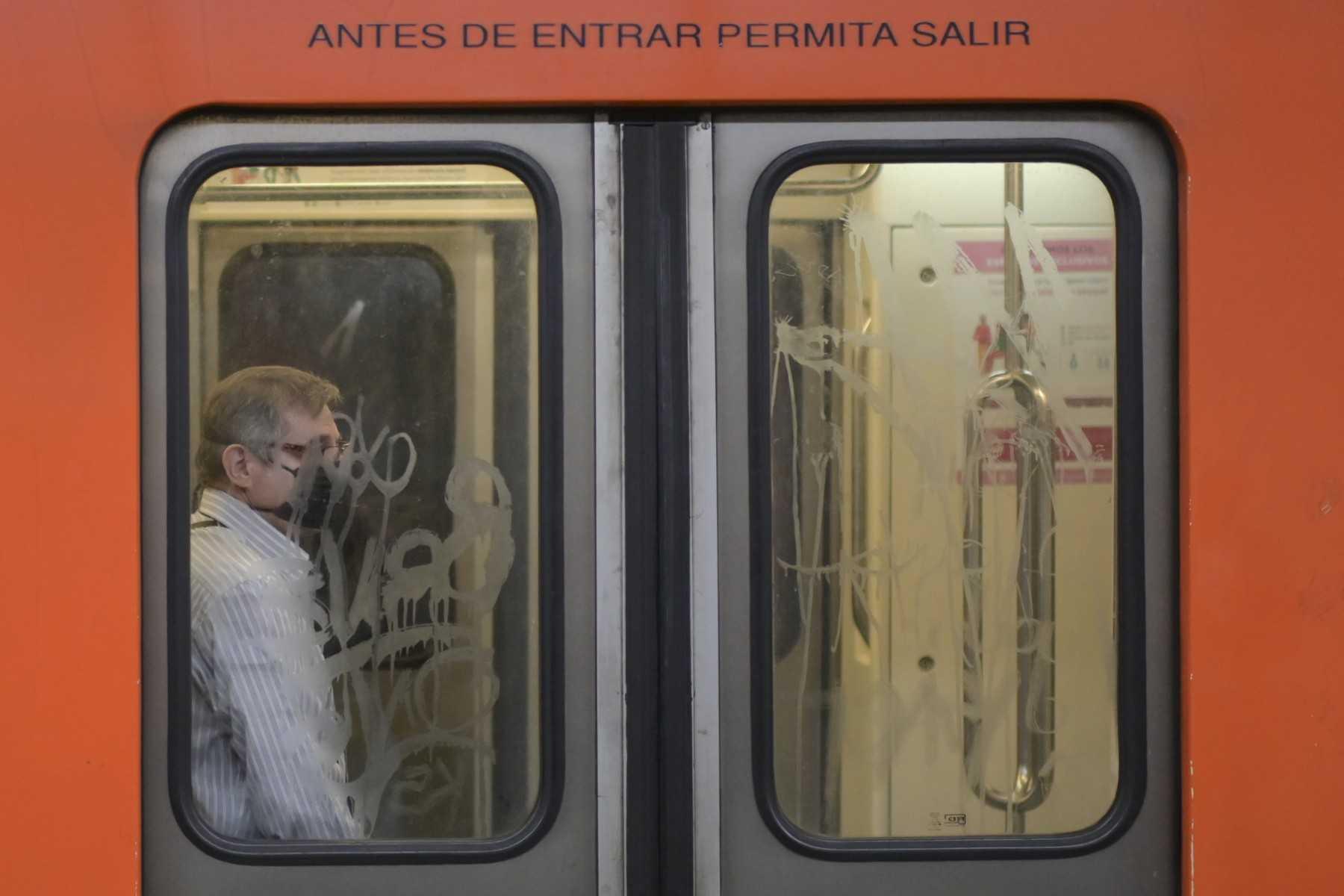 A man rides the subway in Mexico City, on March 24, 2020.