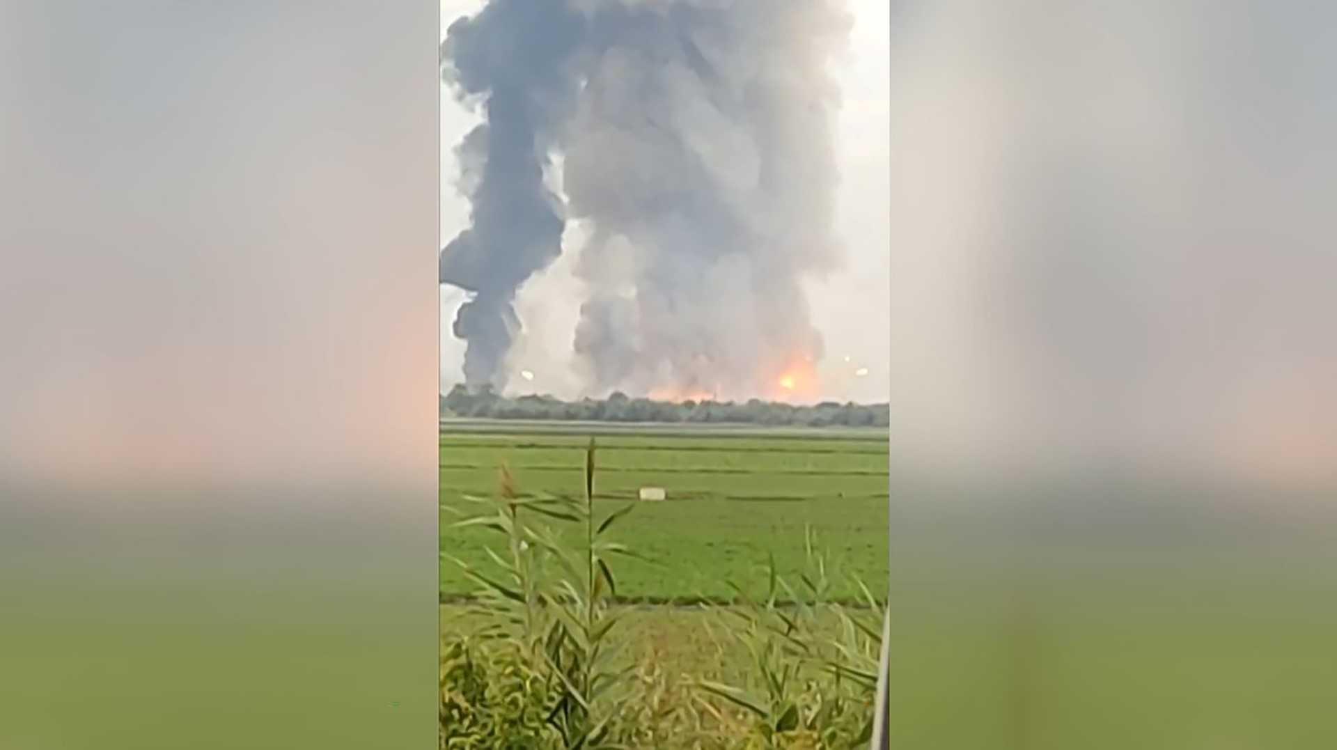 This still frame from a UGC video taken with a smartphone and released on the ESN platform on Aug 16, shows fire and smoke billowing from munitions depot in Crimea early on Aug 16. Photo: AFP 