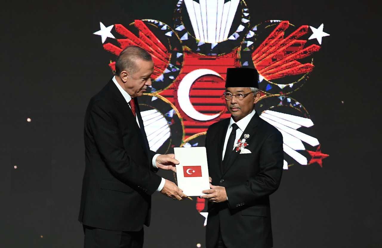 Yang di-Pertuan Agong Sultan Abdullah Sultan Ahmad Shah receives the Turkish Order of the State from Turkiye President Recep Tayyip Erdogan at the Presidential Palace in Ankara. Photo: Bernama