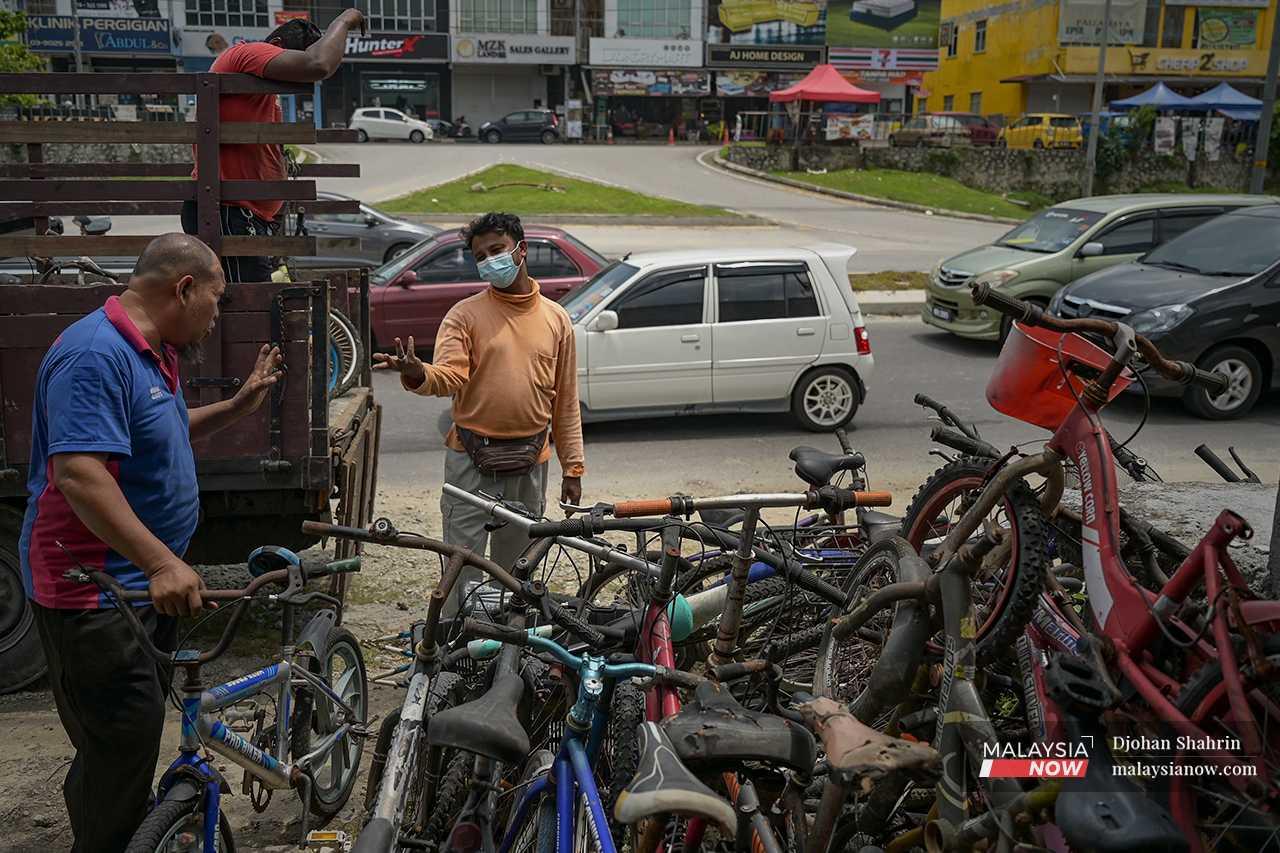 Often, he has to haggle with the sellers to get a good price for the bikes. 