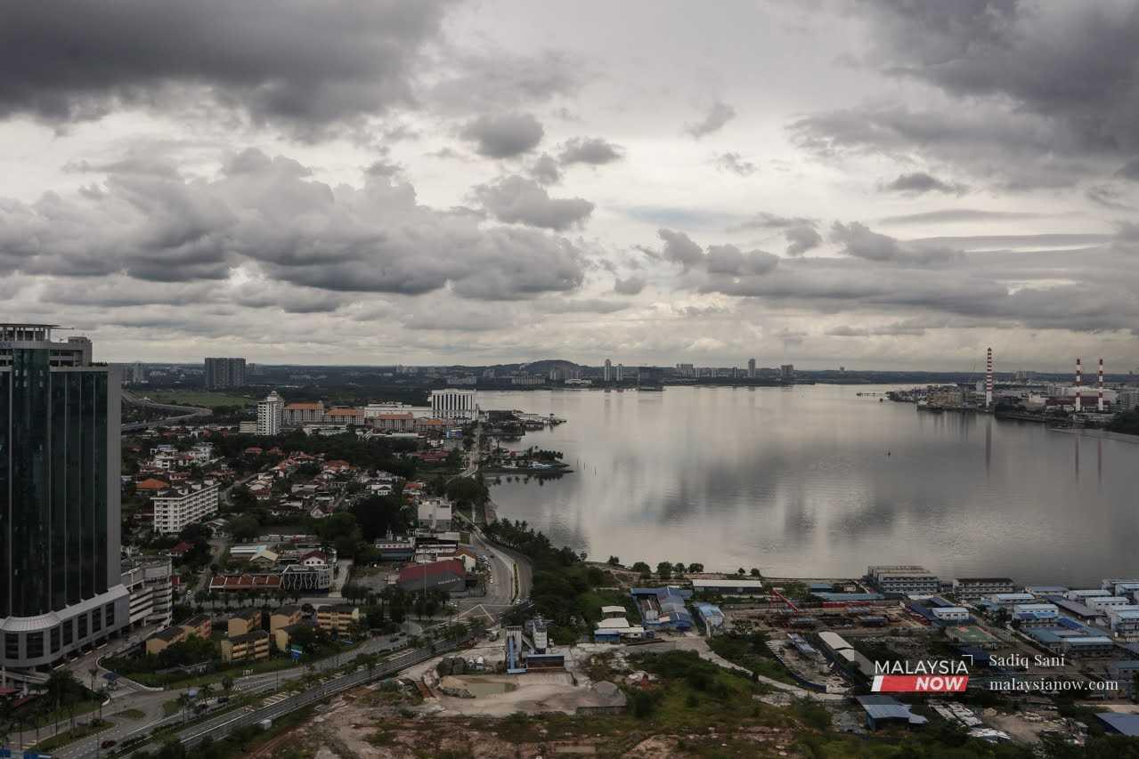 A general view of Johor Bahru, next to the Singapore Strait. For many Malaysians working in the city-state, it is cheaper to live in Johor and make the daily trip across the causeway for work. 
