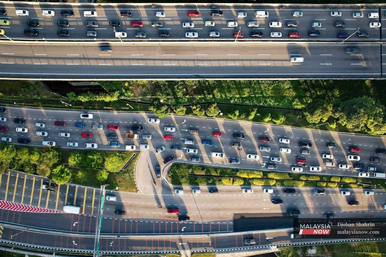 Drivers navigate rush hour traffic along the Sungai Besi-Salak Selatan and MEX highways in the capital city of Kuala Lumpur.