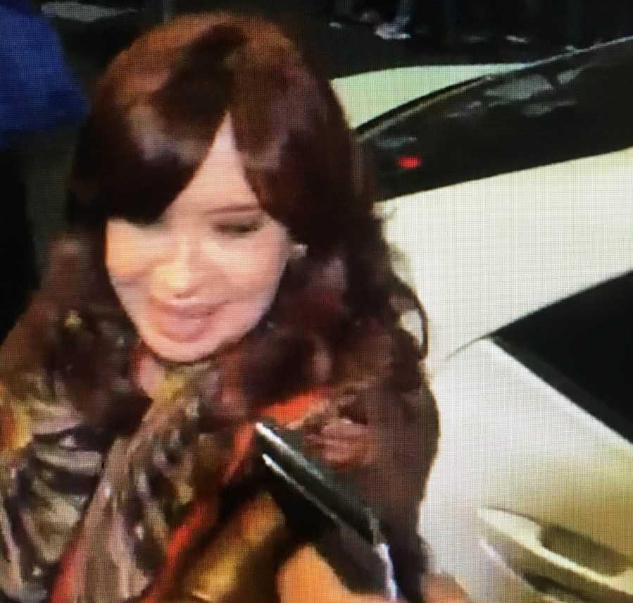 In this photo released by Telam news agency a man points a gun at Argentina's Vice-President Cristina Fernandez de Kirchner as she arrives to her residence in Buenos Aires on Sept 1. Photo: AFP 