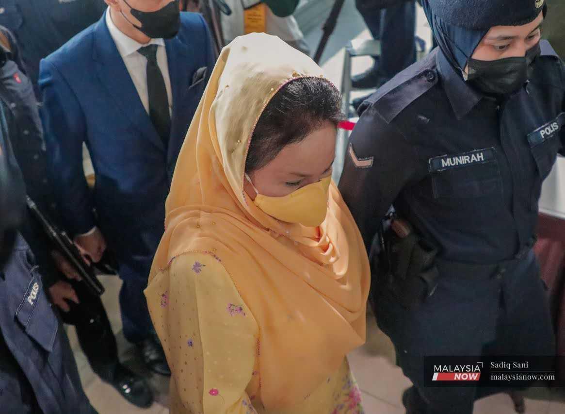 Rosmah Mansor arrives at the Kuala Lumpur court complex for the verdict of her solar hybrid corruption case yesterday.