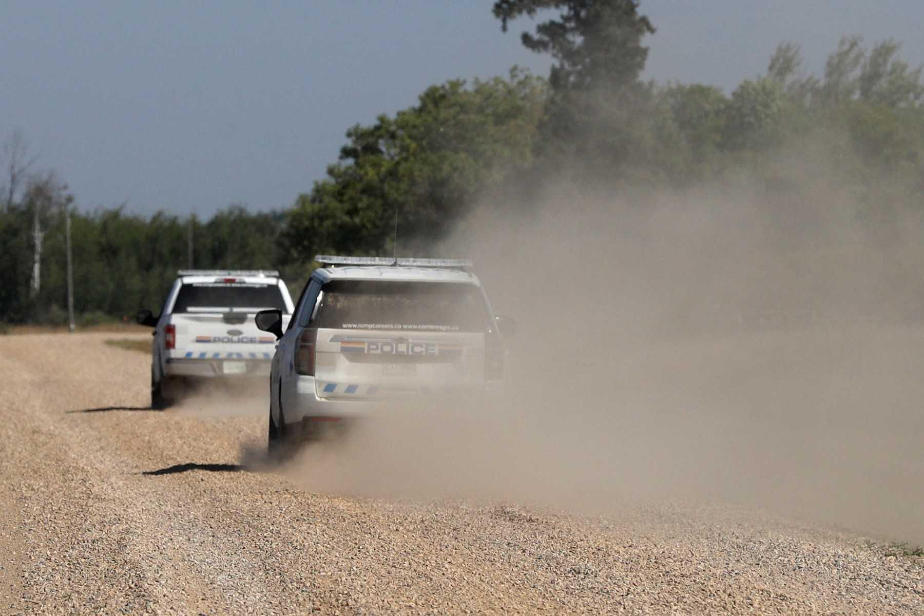 Royal Canadian Mounted Police vehicles patrol James Smith Cree Nation reserve in Canada on Sept 6. Photo: AFP