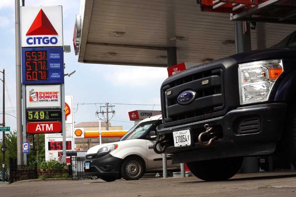 A sign displays gas prices at a gas station on May 10, in Chicago, Illinois. Photo: AFP