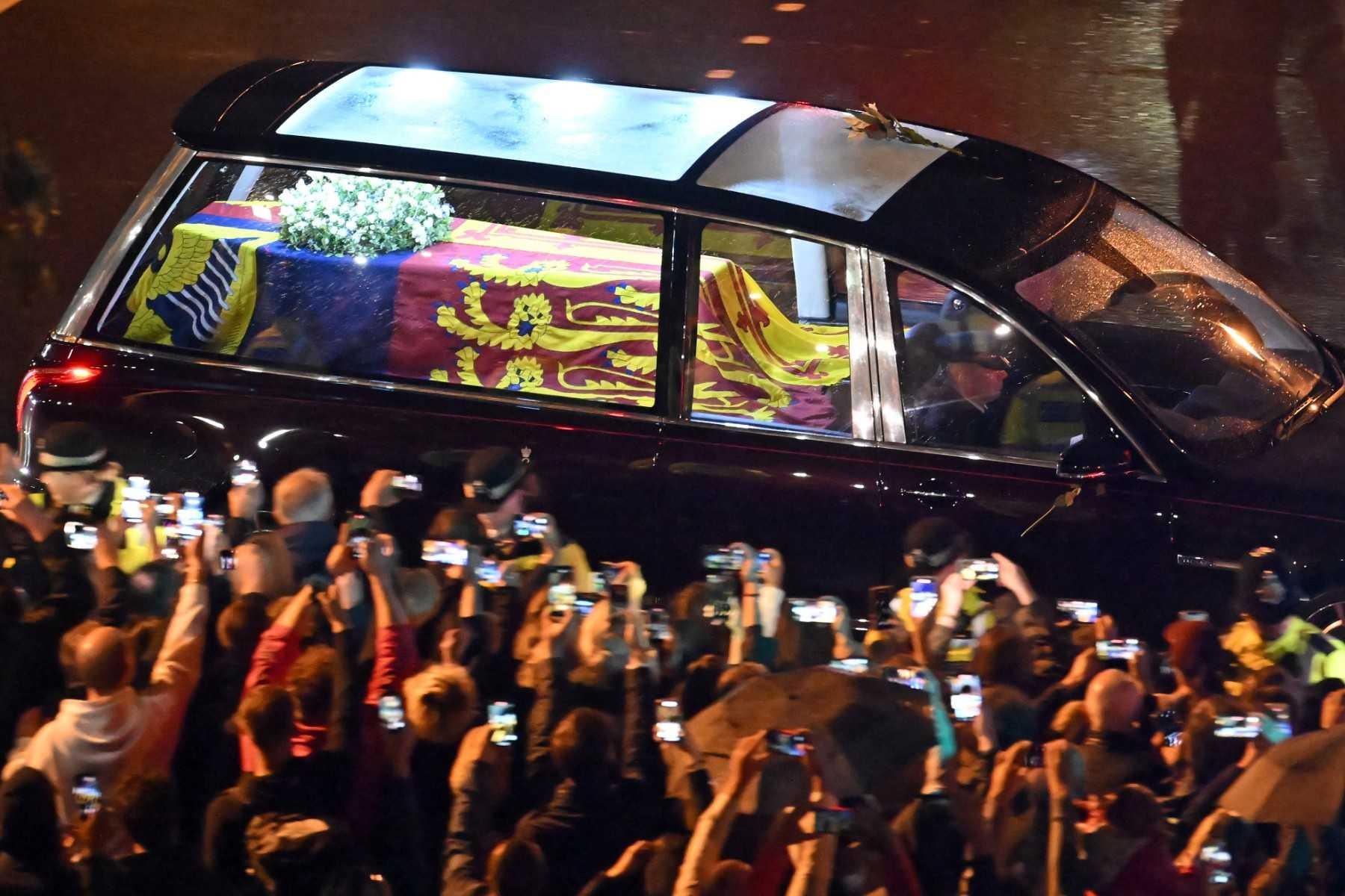Seen from the top of the Wellington Arch, the coffin of Queen Elizabeth II is taken in the Royal Hearse to Buckingham Palace in London on Sept 13, following her death on Sept 8. Photo: AFP