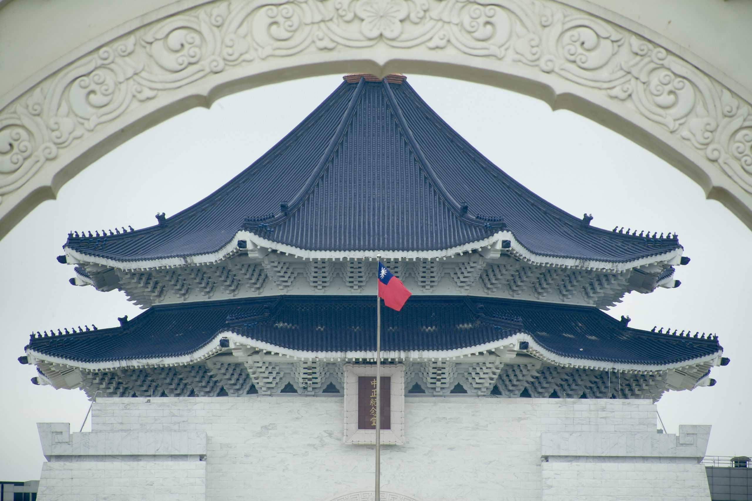 A Taiwan national flag flutters in front of the Chiang Kai-shek Memorial Hall in Taipei on May 24. Photo: AFP