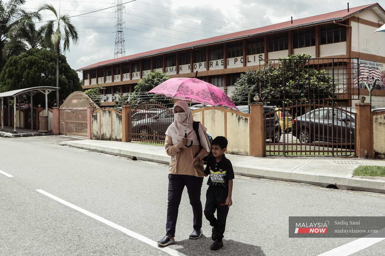 Rayyan, 8, is a Malaysian and can attend the government school near their home.