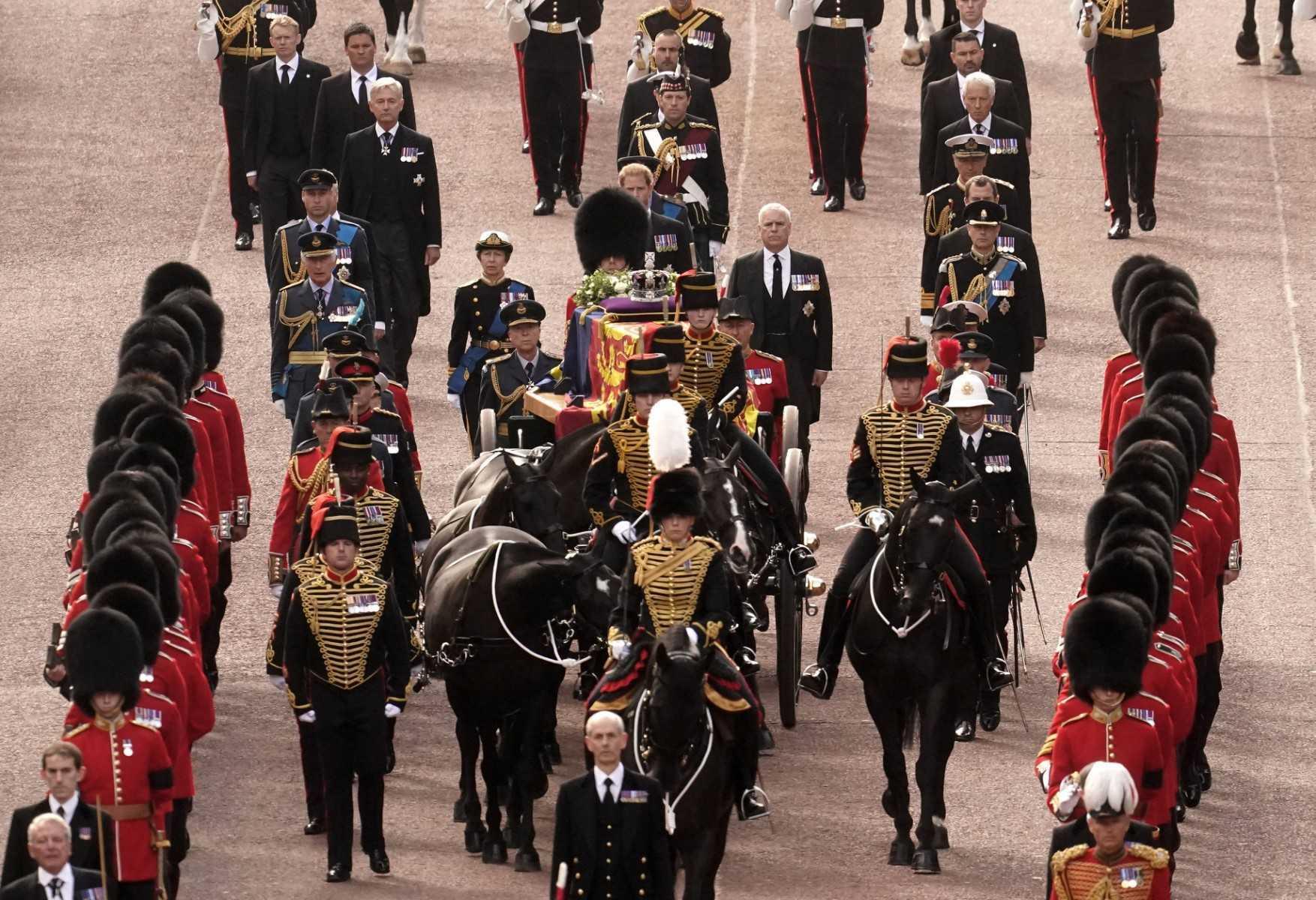 Britain's King Charles III and the royal family walk behind the coffin of Queen Elizabeth II, during a procession from Buckingham Palace to the Palace of Westminster, in London on Sept 14. Photo: AFP 
