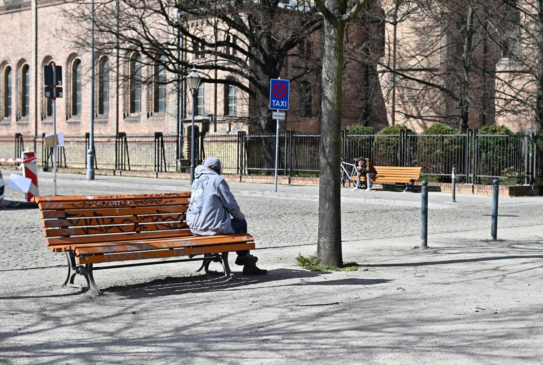 A person sits alone on a bench in Potsdam, eastern Germany on April 4, 2020. Photo: AFP