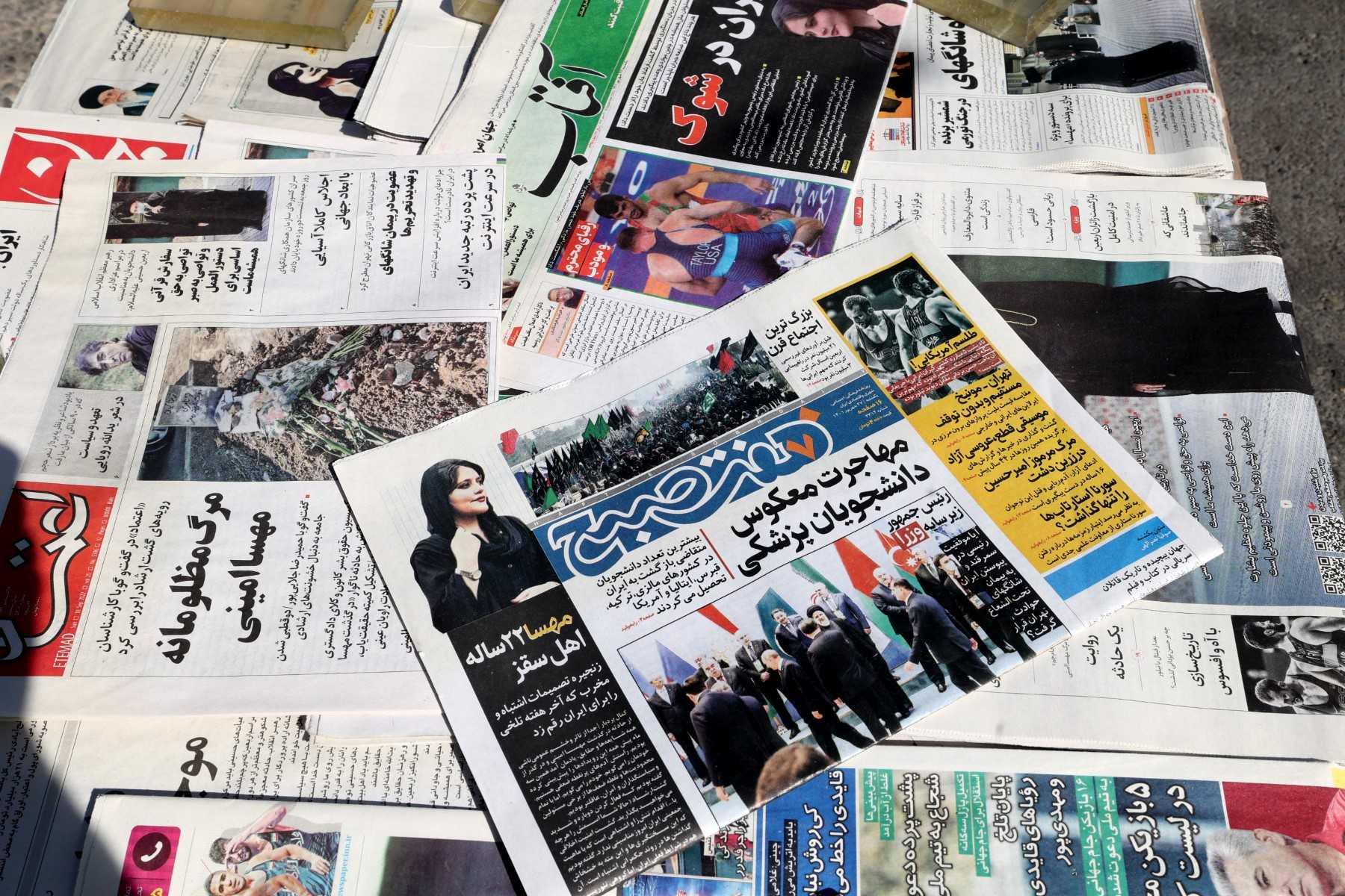 A kiosk in the Iranian capital Tehran displays newspapers on Spet 18, with the front pages featuring articles and photographs of Mahsa Amini, a woman who died after being arrested by the Islamic republic's 'morality police'. Photo: AFP