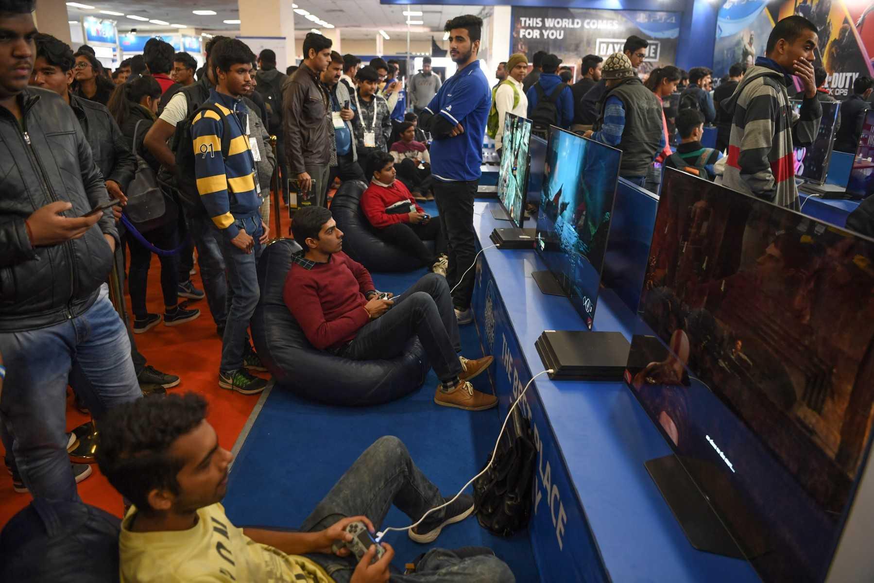 Visitors play video games during the 'India Gaming Show' exhibition in New Delhi on Feb 4, 2019. Photo: AFP