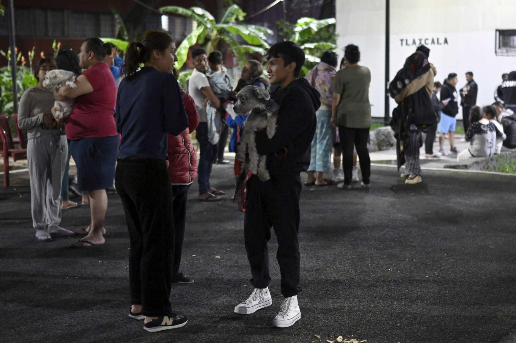 People are seen at the Tlatelolco neighbourhood after a 6.8-magnitude earthquake in Mexico City on Sept 22. Photo: AFP