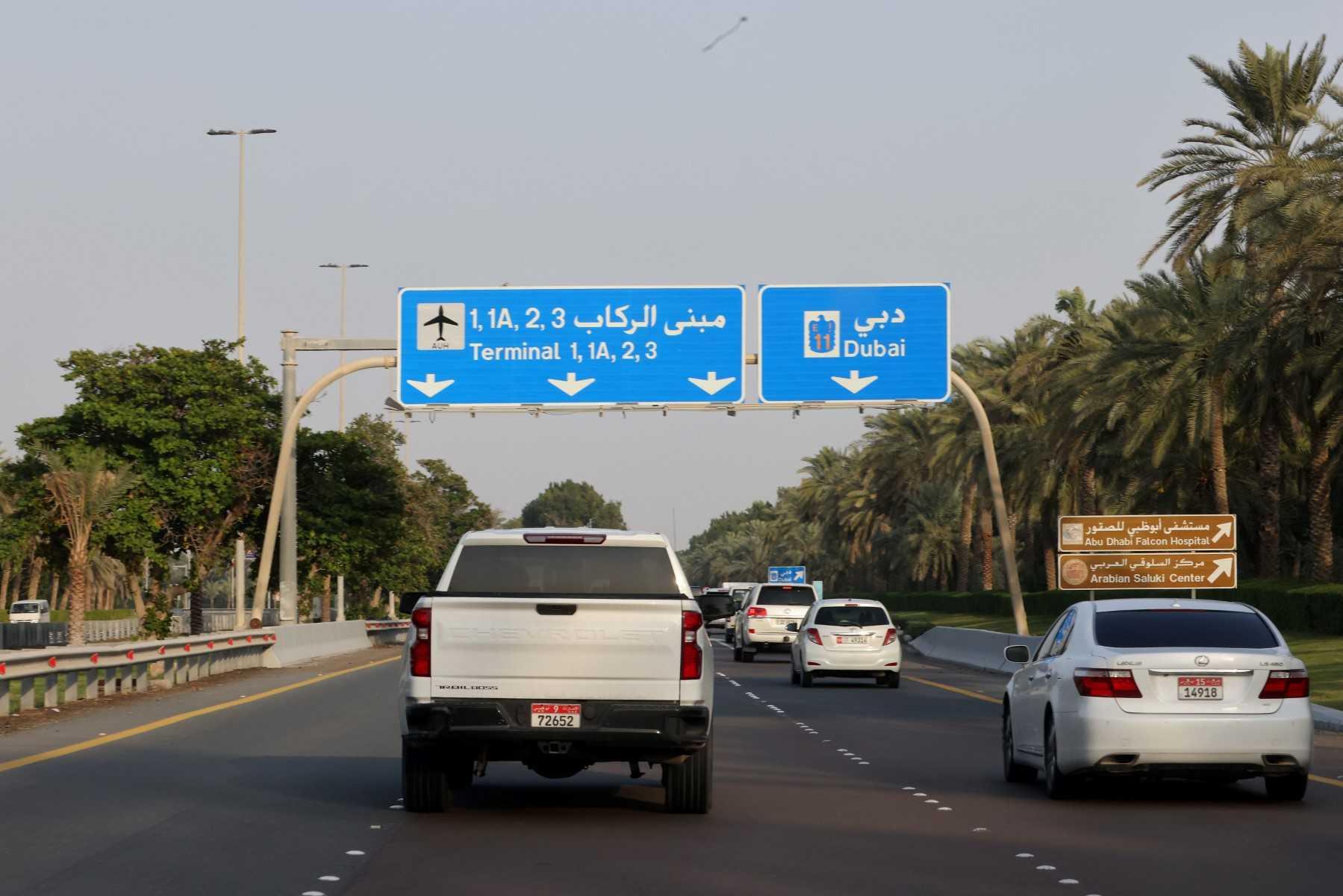 Drivers take a road leading to Abu Dhabi's airport in the capital of the United Arab Emirates, Abu Dhabi, on Jan 17. Photo: AFP