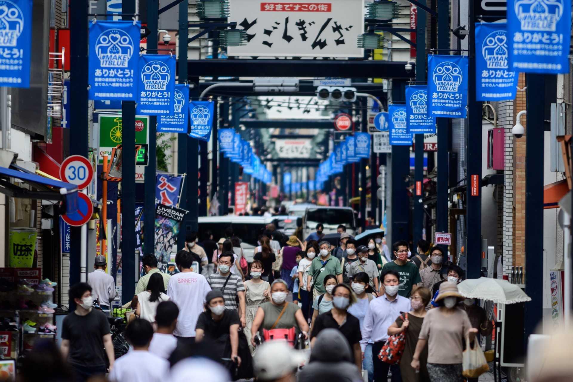 People visit Togoshi Ginza shopping street in Tokyo on Aug 1, 2020. Photo: AFP 