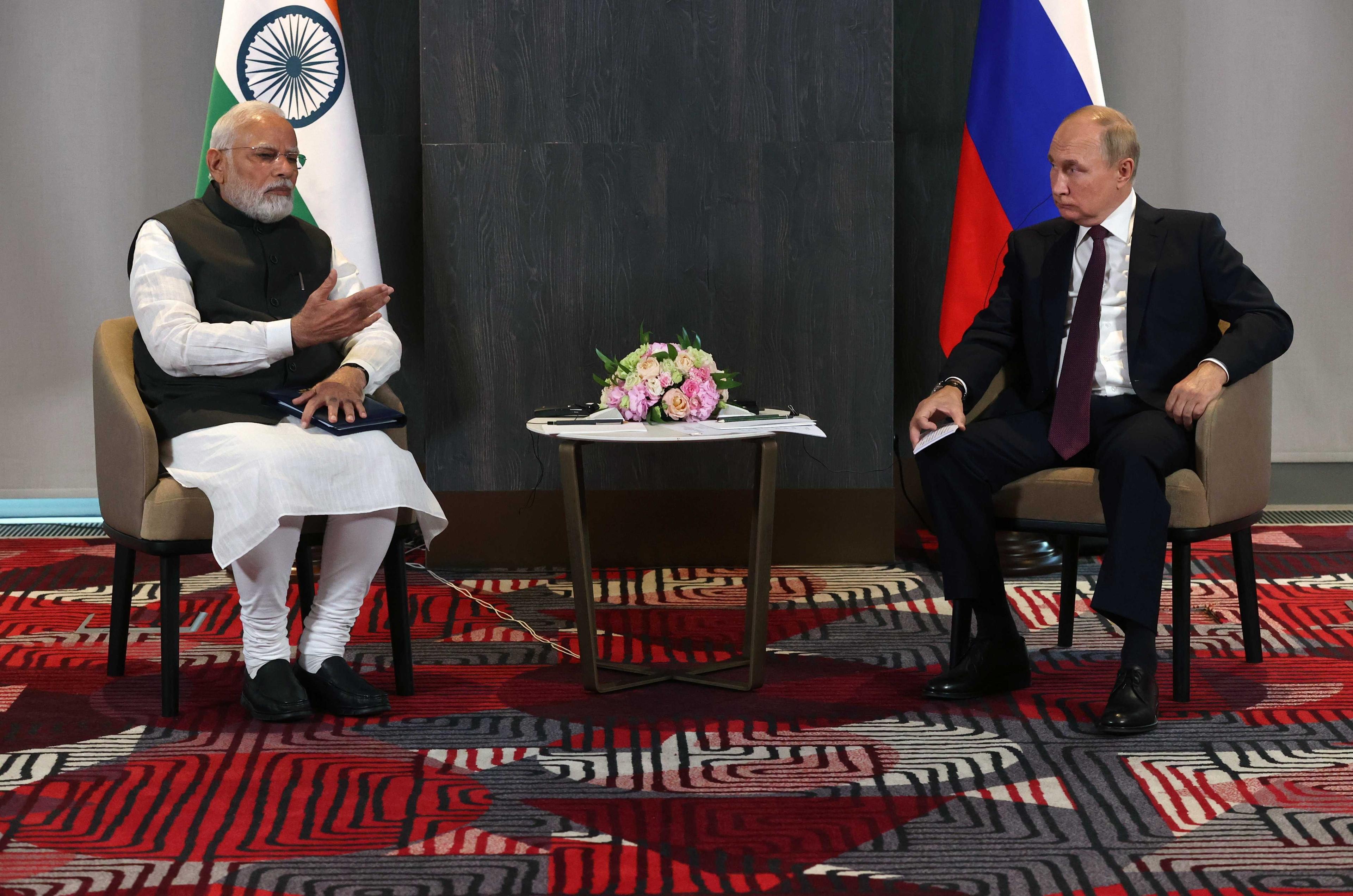 Russian President Vladimir Putin meets with India's Prime Minister Narendra Modi on the sidelines of the Shanghai Cooperation Organisation leaders' summit in Samarkand on Sept 16. Photo: AFP