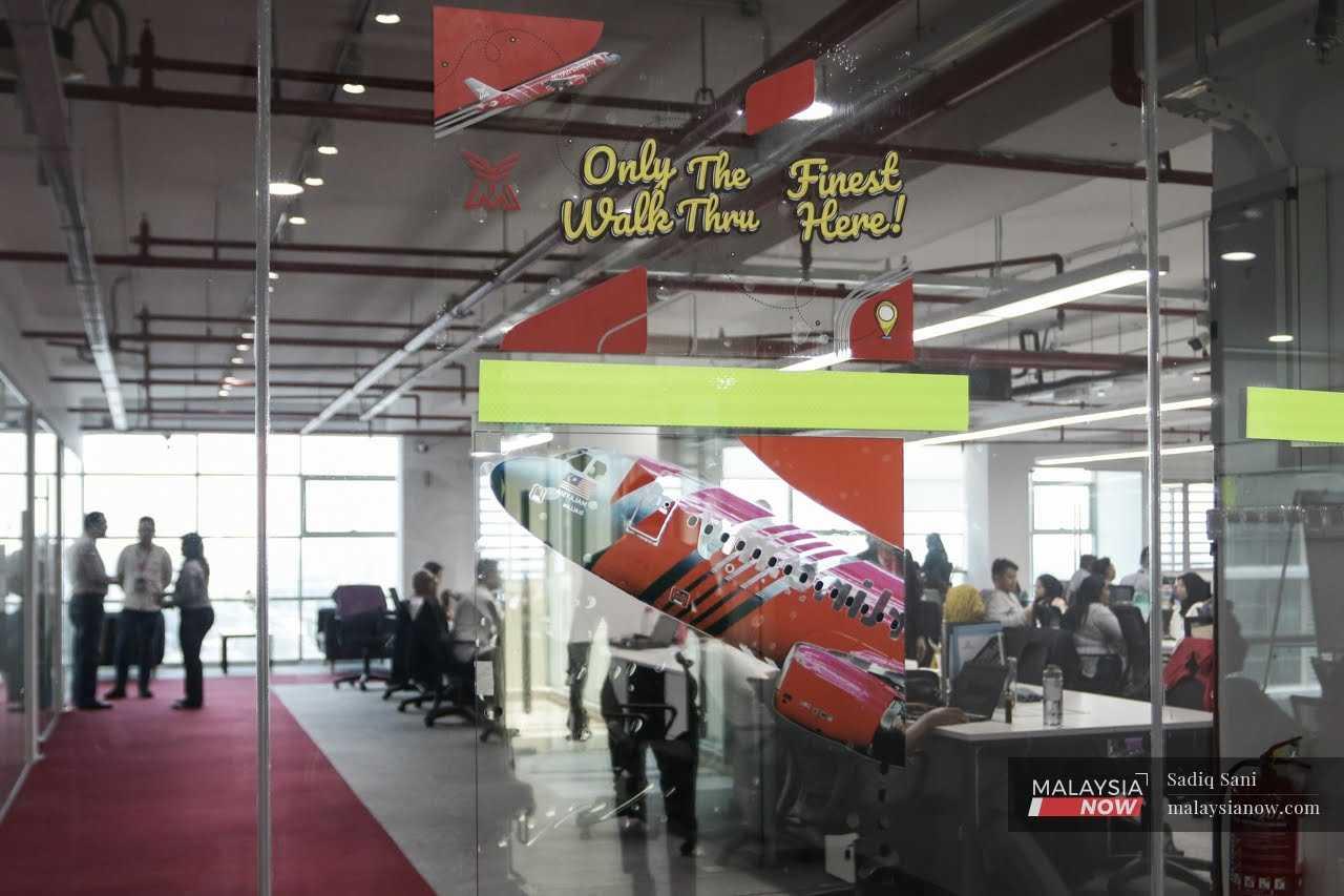 MYAirline staff go about their daily activities at the airline's office in Subang.