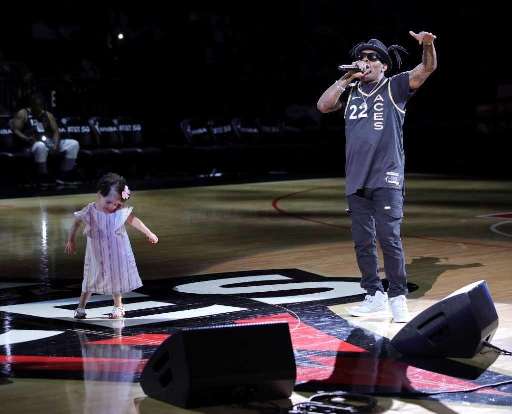 Rapper/actor Coolio and his granddaughter Arya Ivey perform at halftime of a game between the Connecticut Sun and the Las Vegas Aces at Michelob ULTRA Arena on May 31, in Las Vegas, Nevada. Photo: AFP
