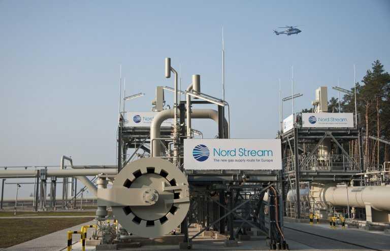 This file photo taken on Nov 8, 2011 shows a helicopter flying over the Nord Stream 1 gas pipeline terminal prior to an inaugural ceremony for the first of Nord Stream's twin 1,224km gas pipeline through the Baltic Sea, in Lubmin, northeastern Germany. Photo: AFP 