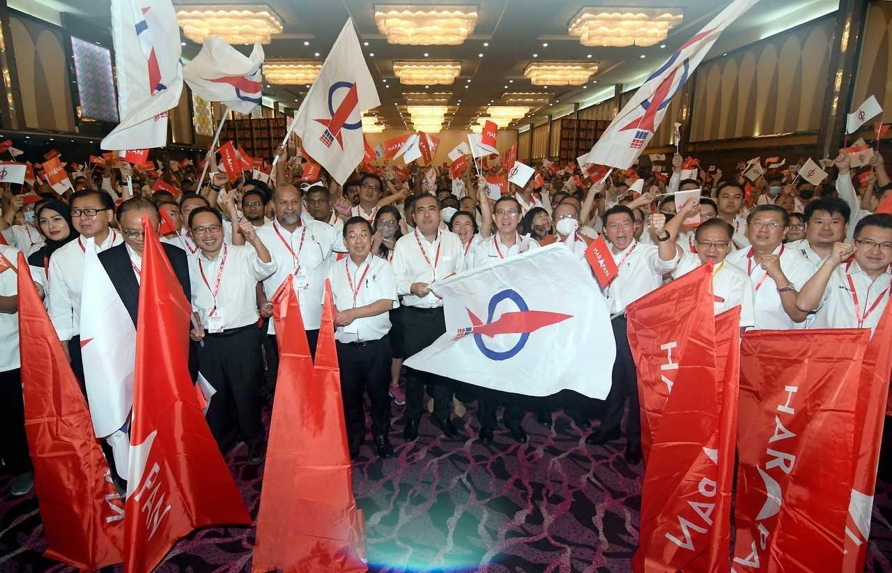 DAP leaders including national chairman Lim Guan Eng pose for a group shot with party members after the launch of the election machinery in Shah Alam on Sept 25. Photo: Bernama